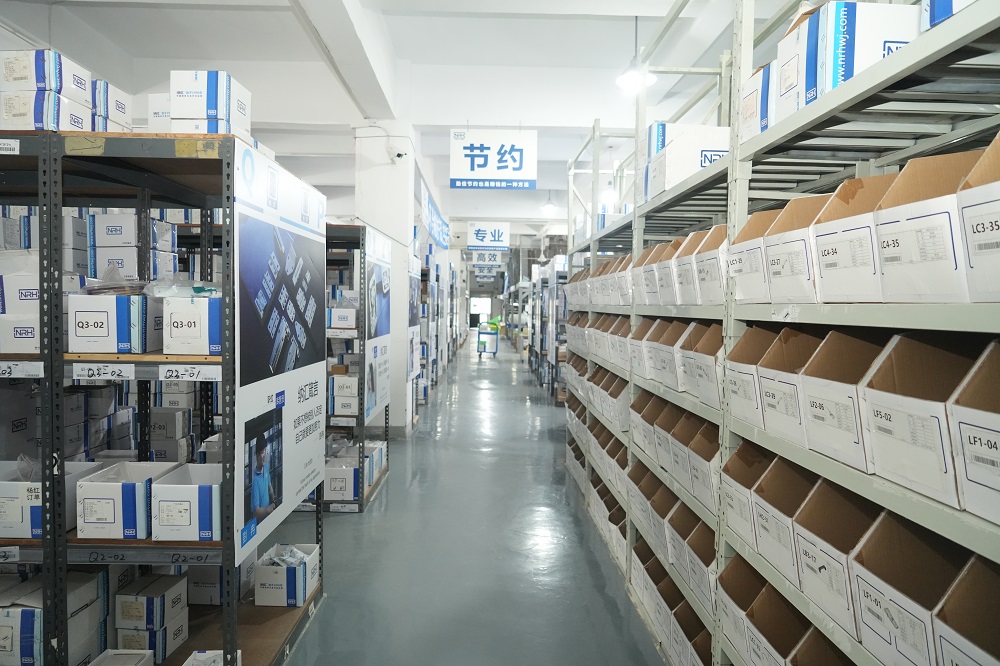 NRH Guangzhou office team and showroom with case hardware samples serving South China and Southeast Asian markets