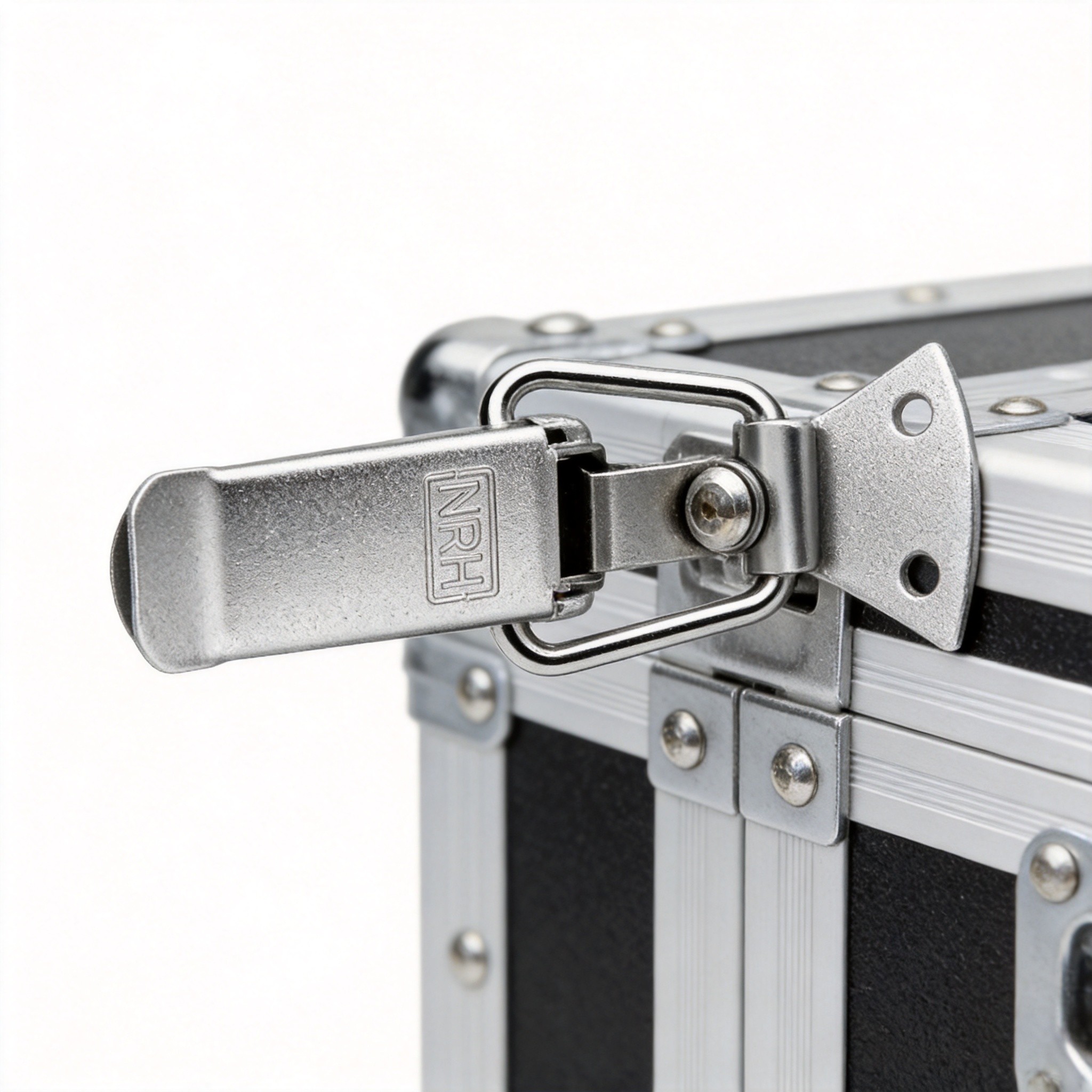 Stainless steel toggle latch mechanism detail on industrial case showing pivot geometry