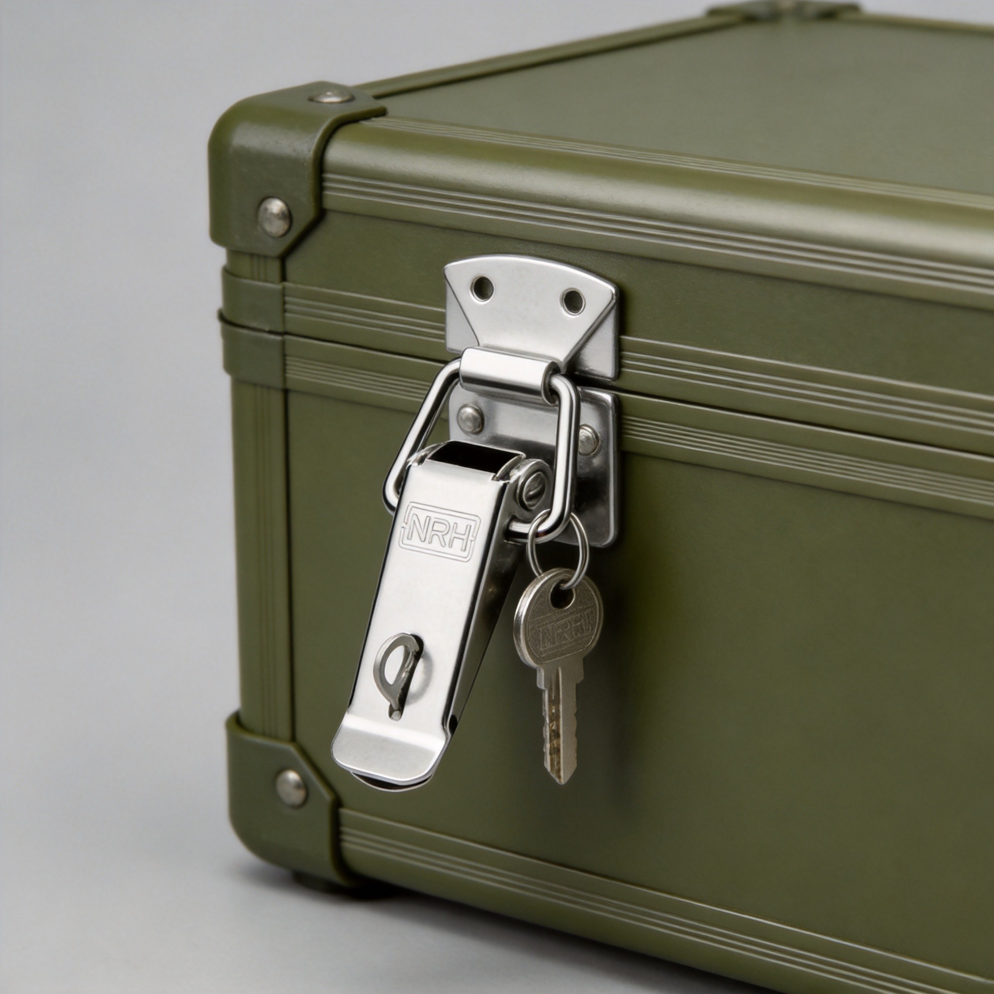 Safety latch with keyed lock mounted on military transport case